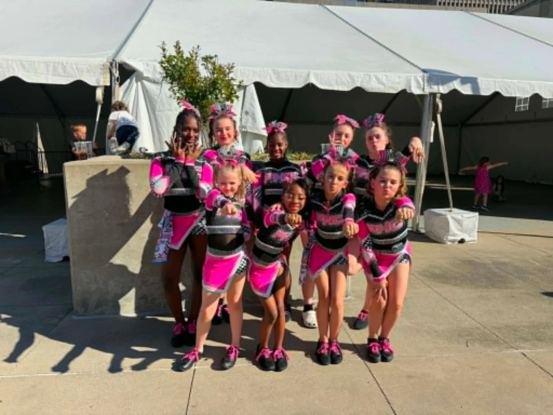 Powerhouse Cheer athletes smiling at practice