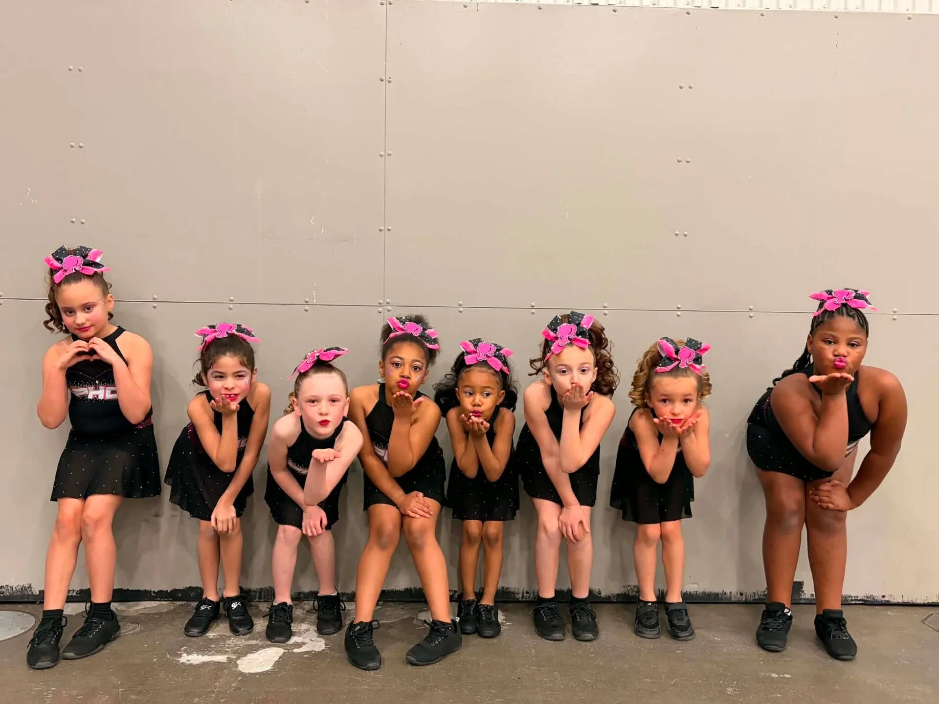 Powerhouse Cheer team members at competition